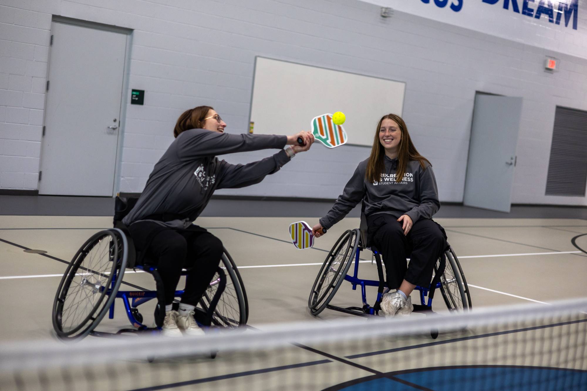 Students playing wheelchair pickleball